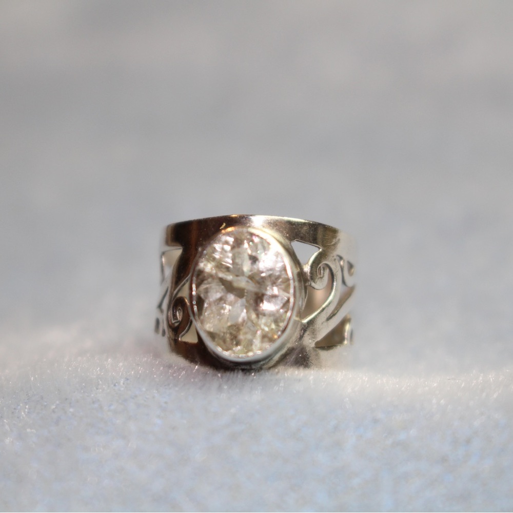Silver stamped 925 ring with clear topaz
